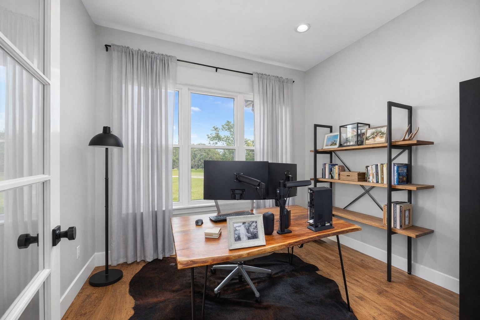 1507 Smith Rau Road Columbus, TX 78934 - Photo 15 of 42 a view of a workspace with furniture and a window