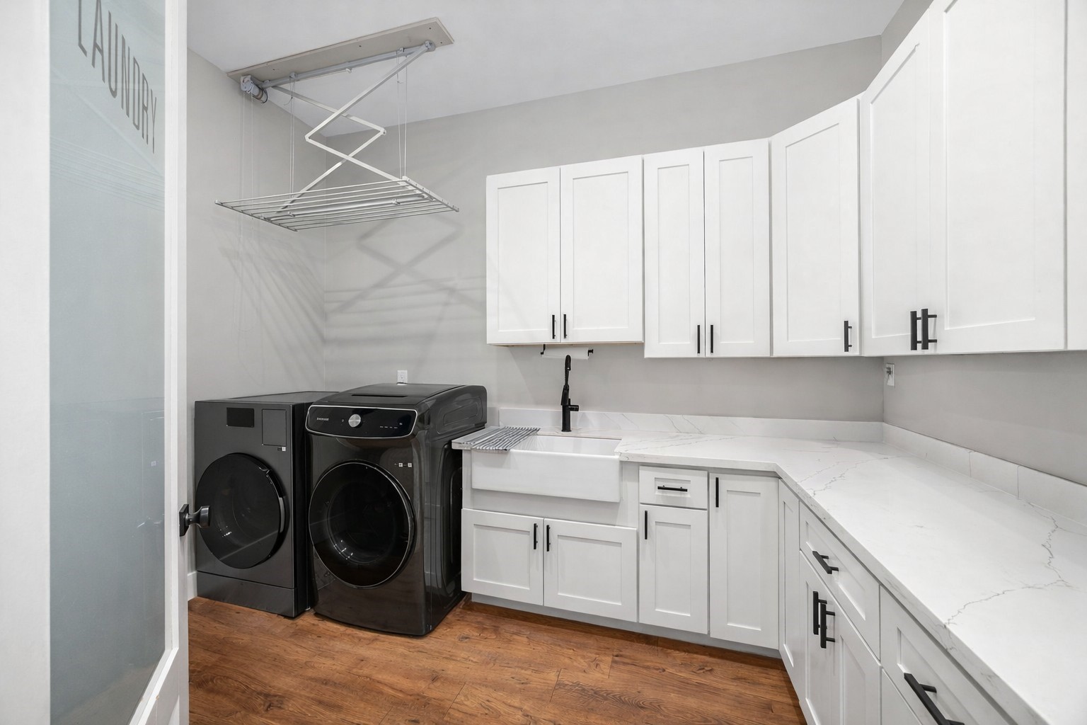 1507 Smith Rau Road Columbus, TX 78934 - Photo 20 of 42 a utility room with cabinets washer and dryer