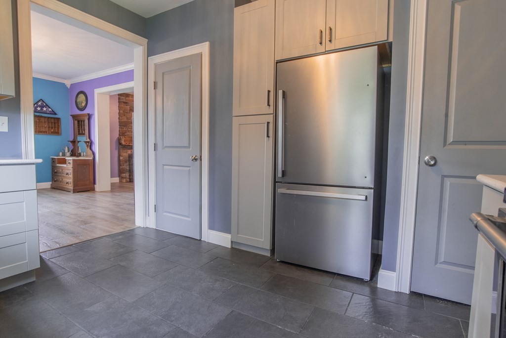 432 Colerain Street Sligo, PA 16255 - Photo 12 of 44 a kitchen with stainless steel appliances a refrigerator and cabinets