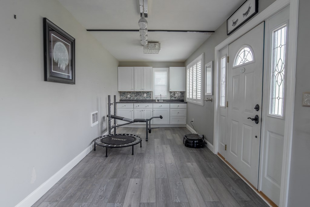 432 Colerain Street Sligo, PA 16255 - Photo 17 of 44 a very nice looking room with wooden floor and a window