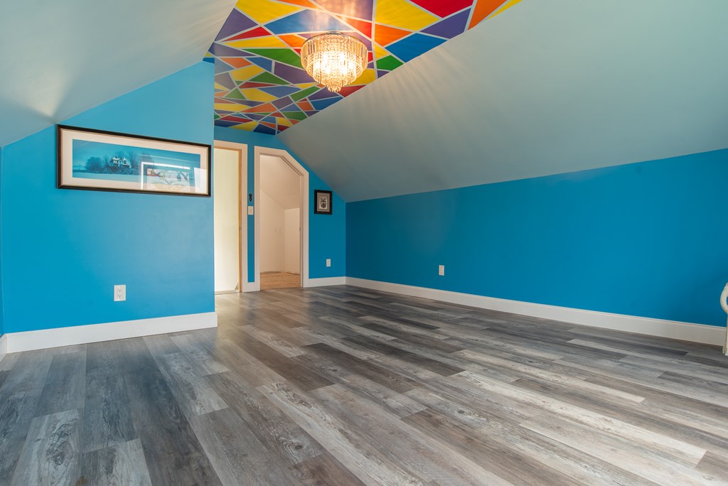 432 Colerain Street Sligo, PA 16255 - Photo 19 of 44 a view of a room with wooden floor and windows
