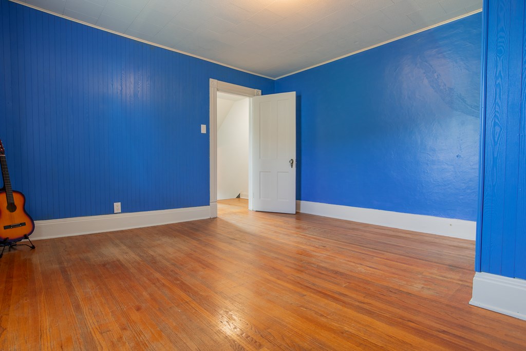 432 Colerain Street Sligo, PA 16255 - Photo 25 of 44 a view of an empty room and wooden floor