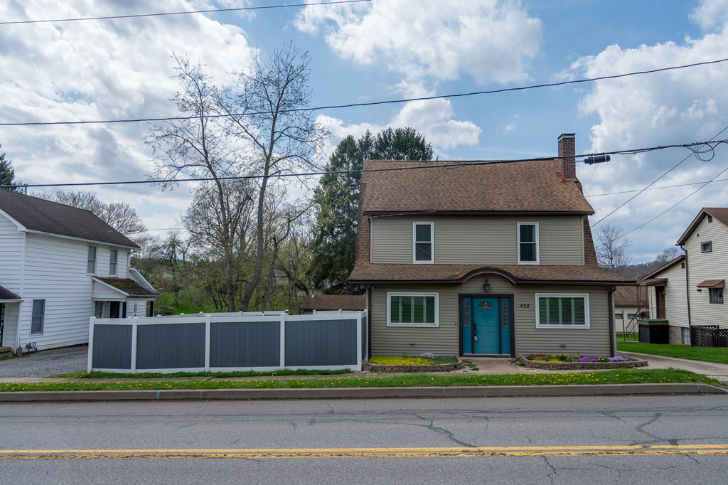432 Colerain Street Sligo, PA 16255 - Photo 32 of 44 a view of a brick house next to a yard