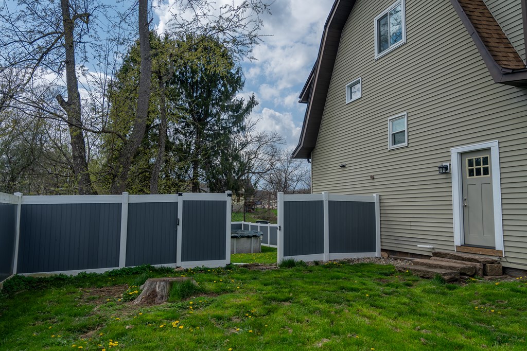 432 Colerain Street Sligo, PA 16255 - Photo 35 of 44 a backyard of a house with plants and large tree