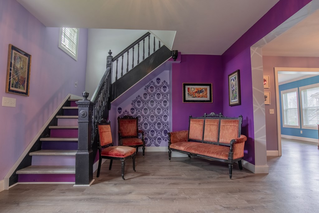 432 Colerain Street Sligo, PA 16255 - Photo 5 of 44 a living room with furniture and a stair