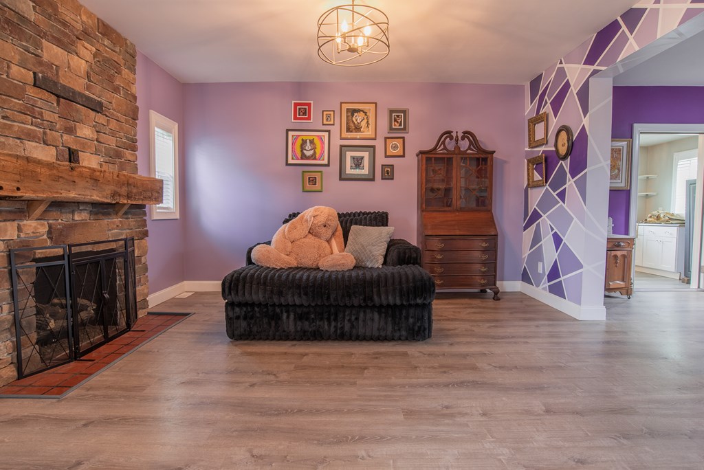 432 Colerain Street Sligo, PA 16255 - Photo 8 of 44 a living room with furniture and a fireplace