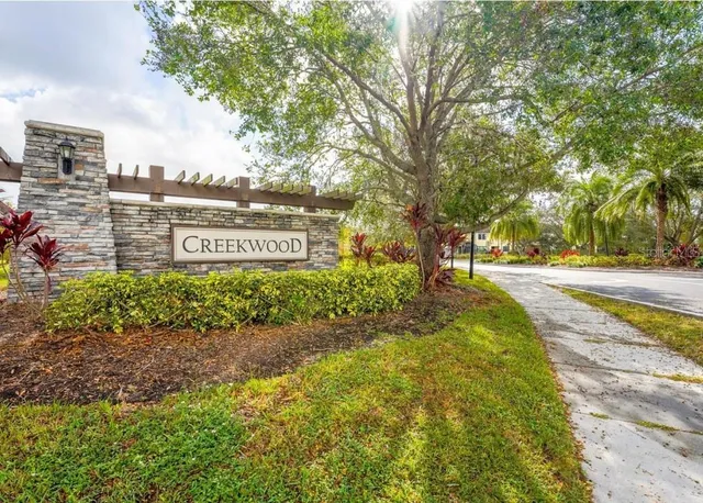 a sign board with parking space