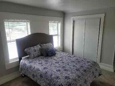 1103 East Moore Avenue, Unit 1 Terrell, TX 75160 - Photo 10 of 12 Carpeted bedroom featuring a closet and baseboards
