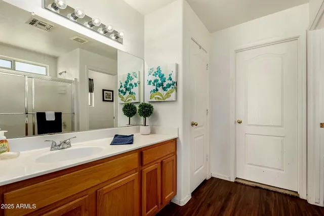 a view of a terrace with a table and chairs