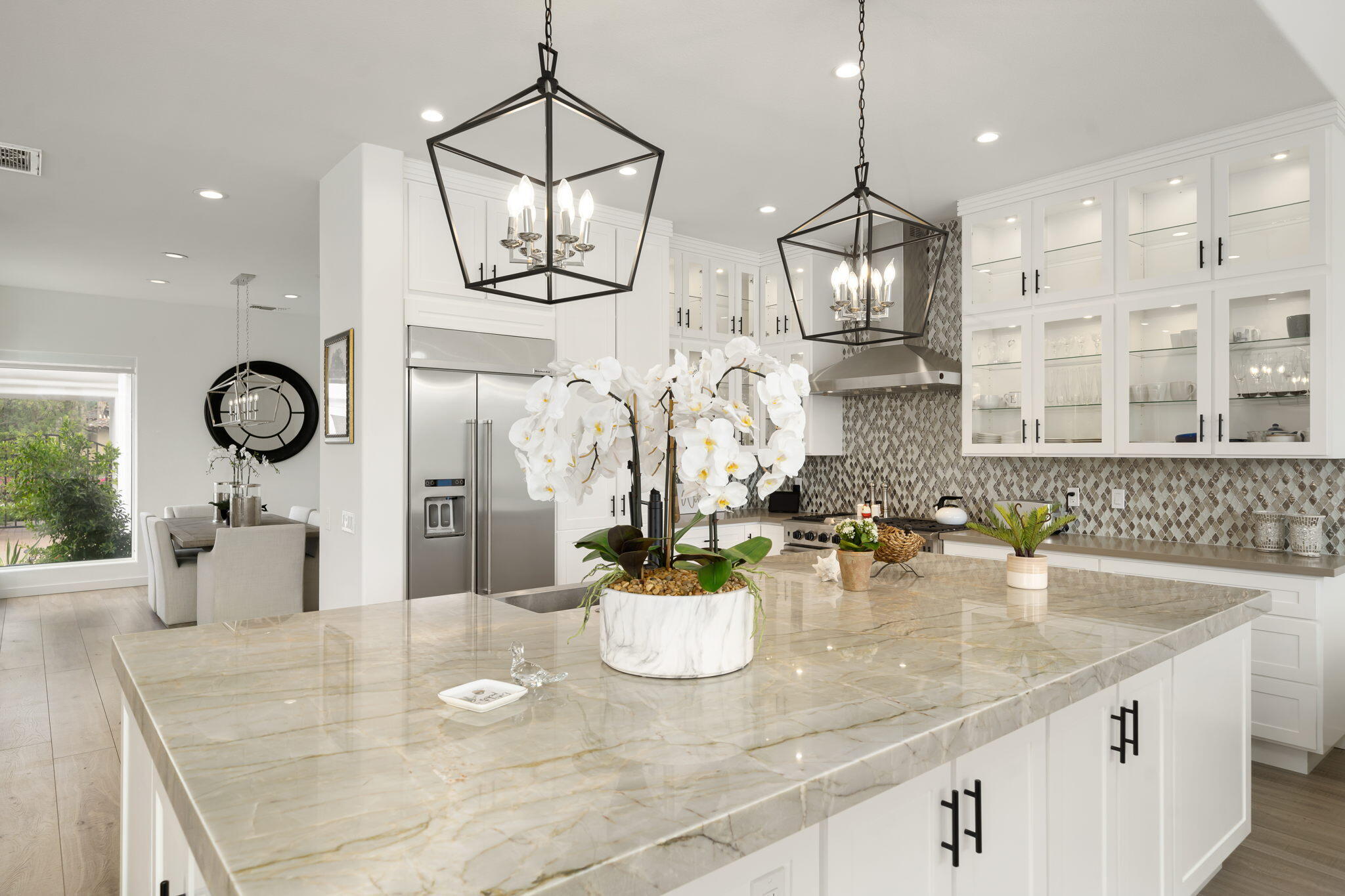 a kitchen with a table and chairs in it