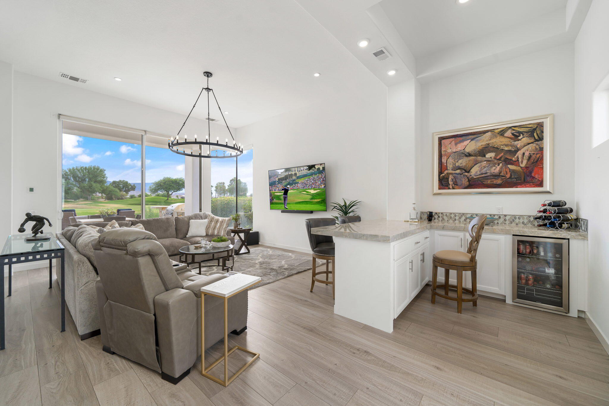 207 Loch Lomond Road Rancho Mirage, CA 92270 - Photo 11 of 50 a living room with furniture a dining table and a stove