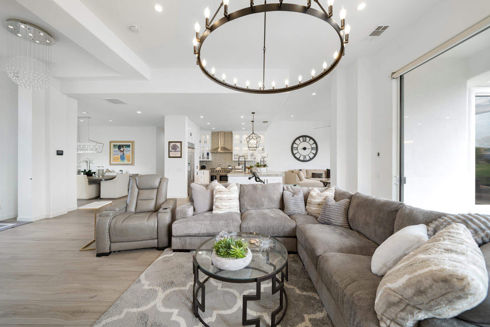 207 Loch Lomond Road Rancho Mirage, CA 92270 - Photo 14 of 50 a living room with furniture a rug and a mirror