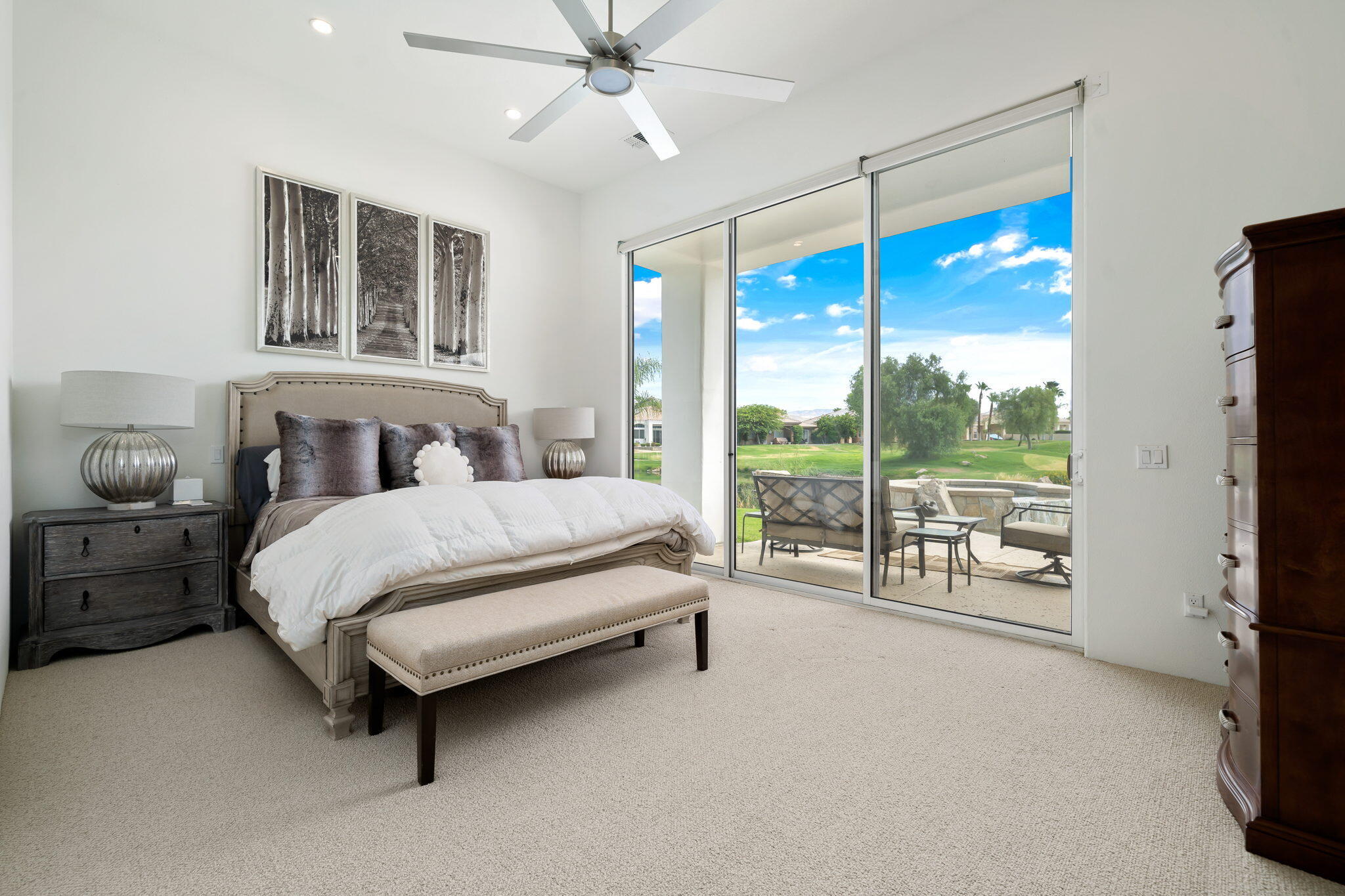 207 Loch Lomond Road Rancho Mirage, CA 92270 - Photo 24 of 50 a bedroom with a bed and large window