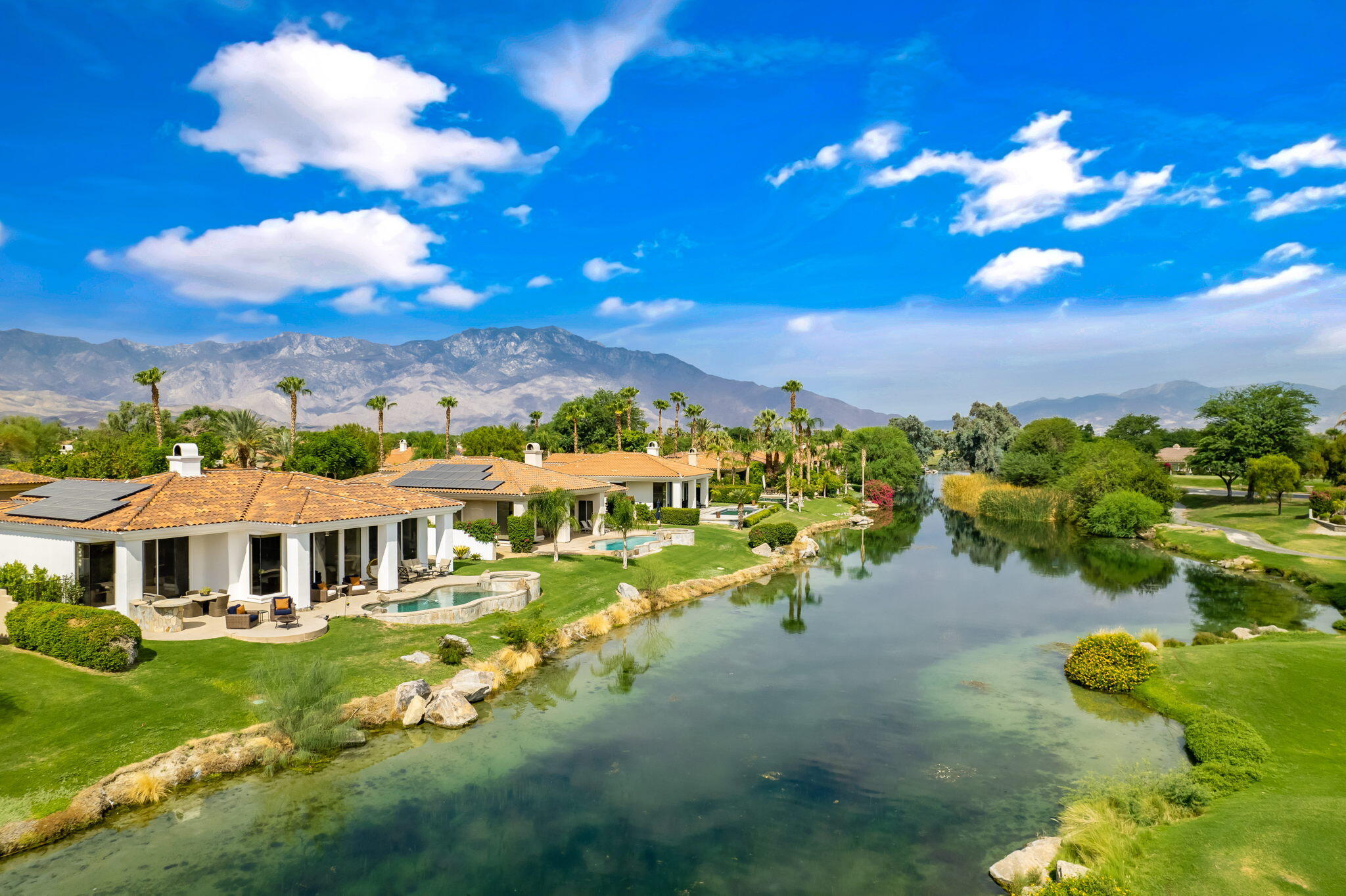 207 Loch Lomond Road Rancho Mirage, CA 92270 - Photo 3 of 50 a view of a house with a yard