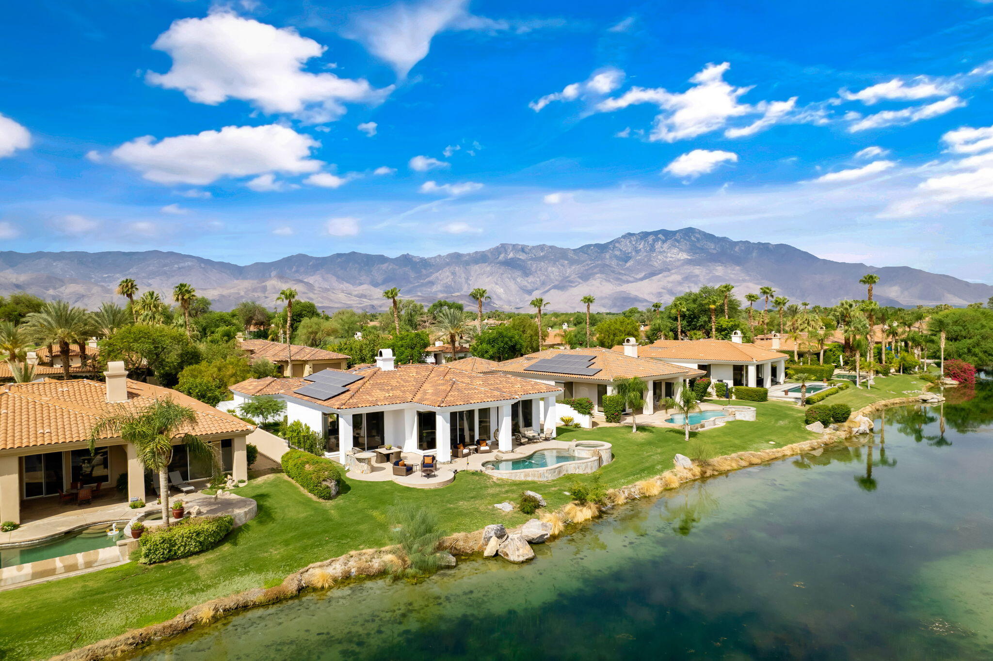 207 Loch Lomond Road Rancho Mirage, CA 92270 - Photo 50 of 50 a view of a town with swimming pool and mountains