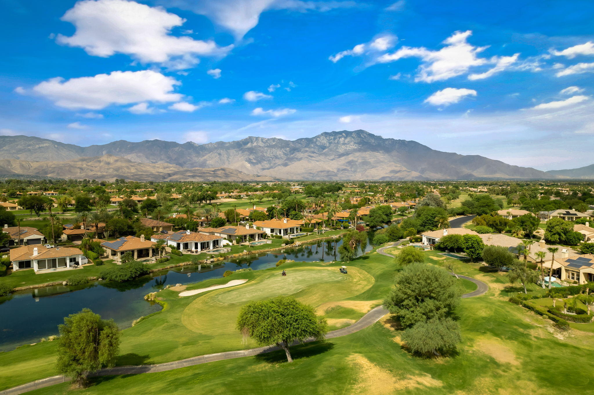 207 Loch Lomond Road Rancho Mirage, CA 92270 - Photo 5 of 50 a view of a city with mountains in the background