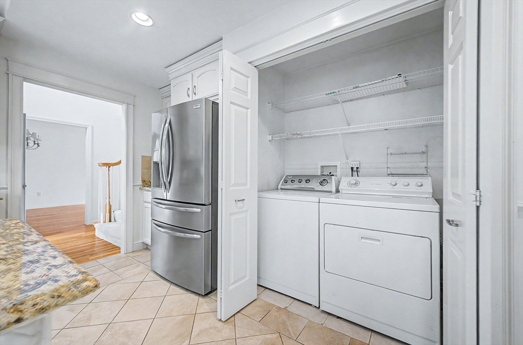 3 Oak View Terrace, Unit 3 Franklin, MA 02038 - Photo 10 of 38 a kitchen with a refrigerator sink and cabinets