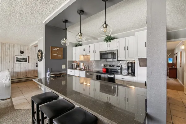 a bedroom with a bed and a walk in closet