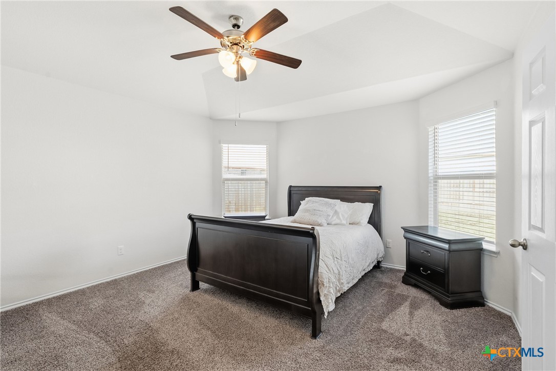 212 Bainbridge Road Temple, TX 76502 - Photo 16 of 35 a spacious bedroom with a bed and a window