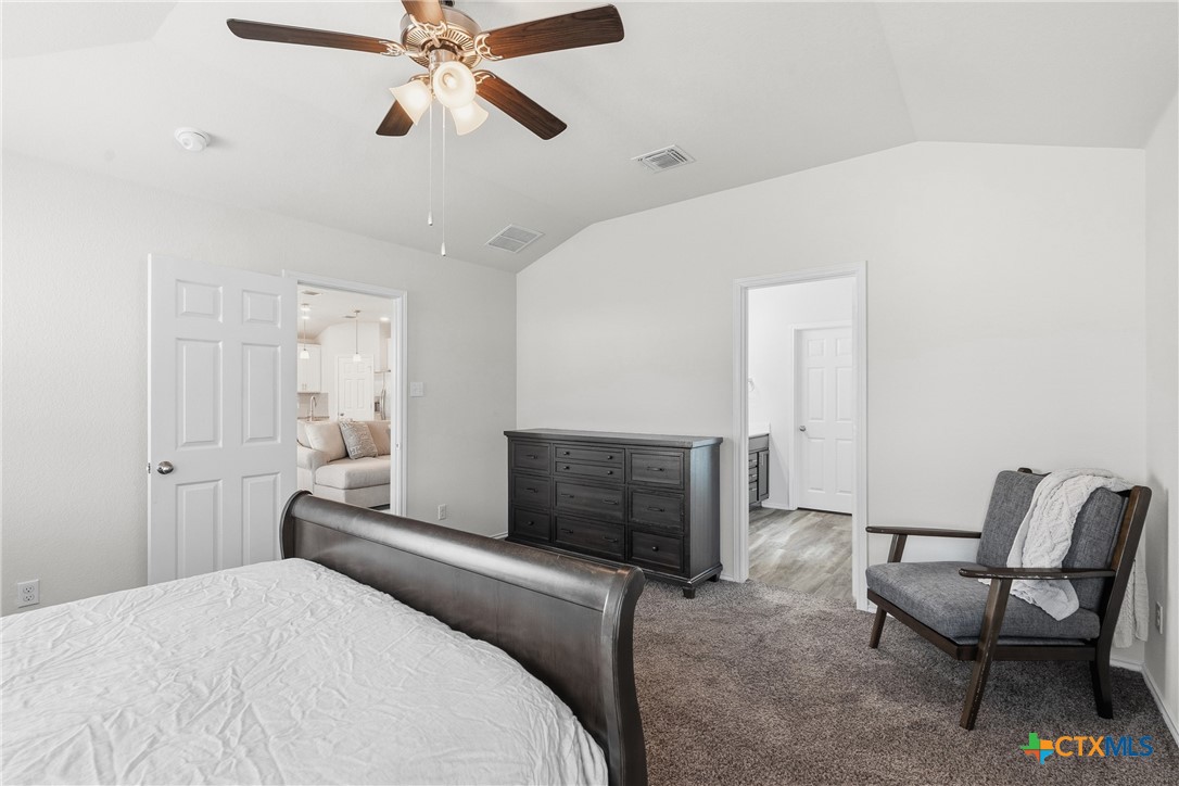 212 Bainbridge Road Temple, TX 76502 - Photo 17 of 35 a bedroom with a bed and a chair