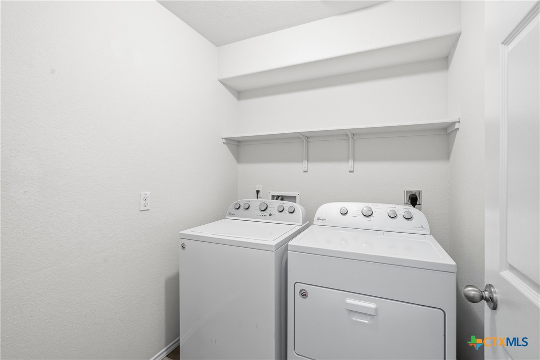 212 Bainbridge Road Temple, TX 76502 - Photo 26 of 35 a utility room with dryer and washer