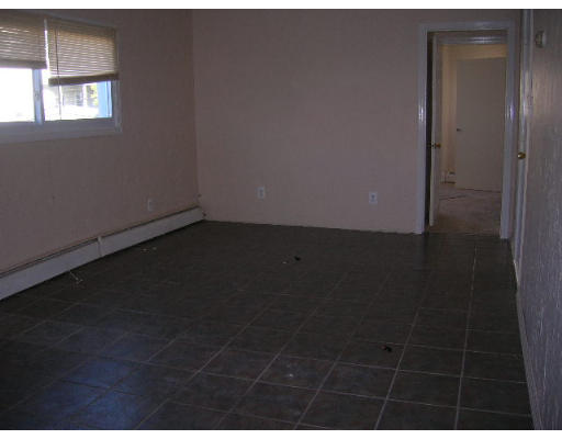 295 Shirley Street, Unit 2 Winthrop, MA 02152 - Photo 5 of 12 a view of an empty room and window