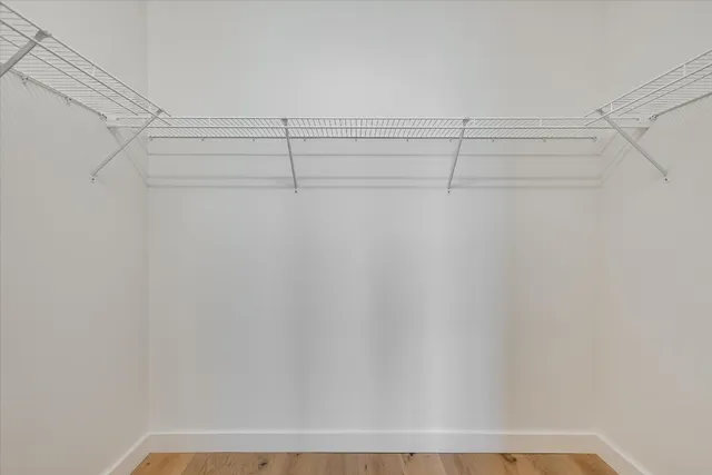 a view of a room with racks on the wall