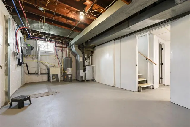 a view of an empty room with stairs