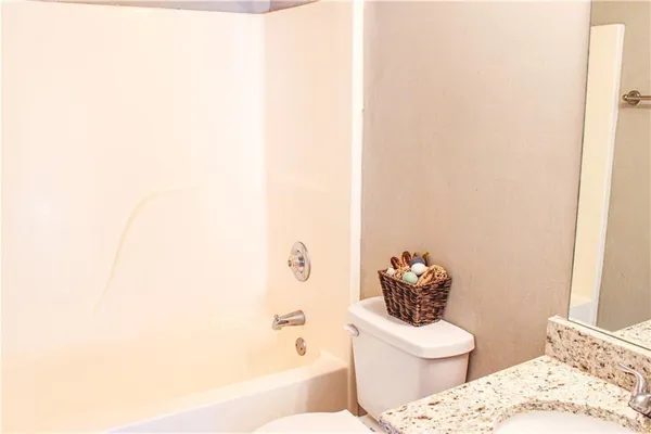 a bathroom with a sink and a toilet