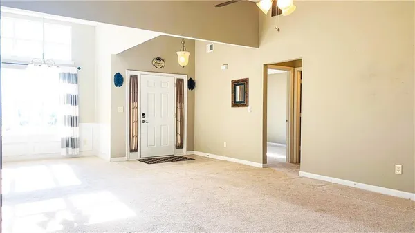 a view of a hallway with a white walls