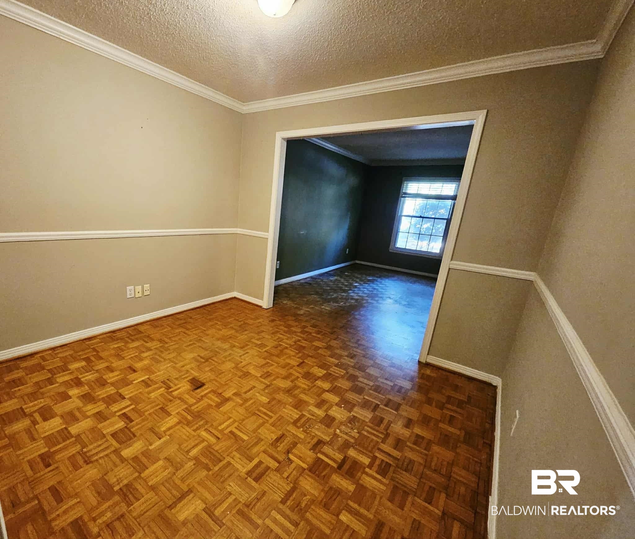 324 Vanderbilt Drive Mobile, AL 36608 - Photo 7 of 17 Empty room with a textured ceiling and ornamental molding