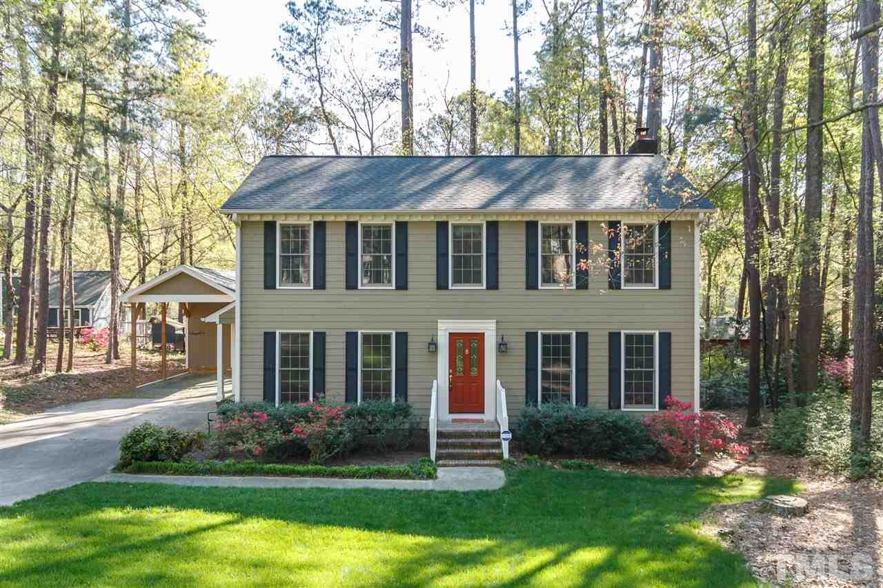 7420 Old Fox Trail Raleigh, NC 27613 - Photo 1 of 28 front view of a house with a yard