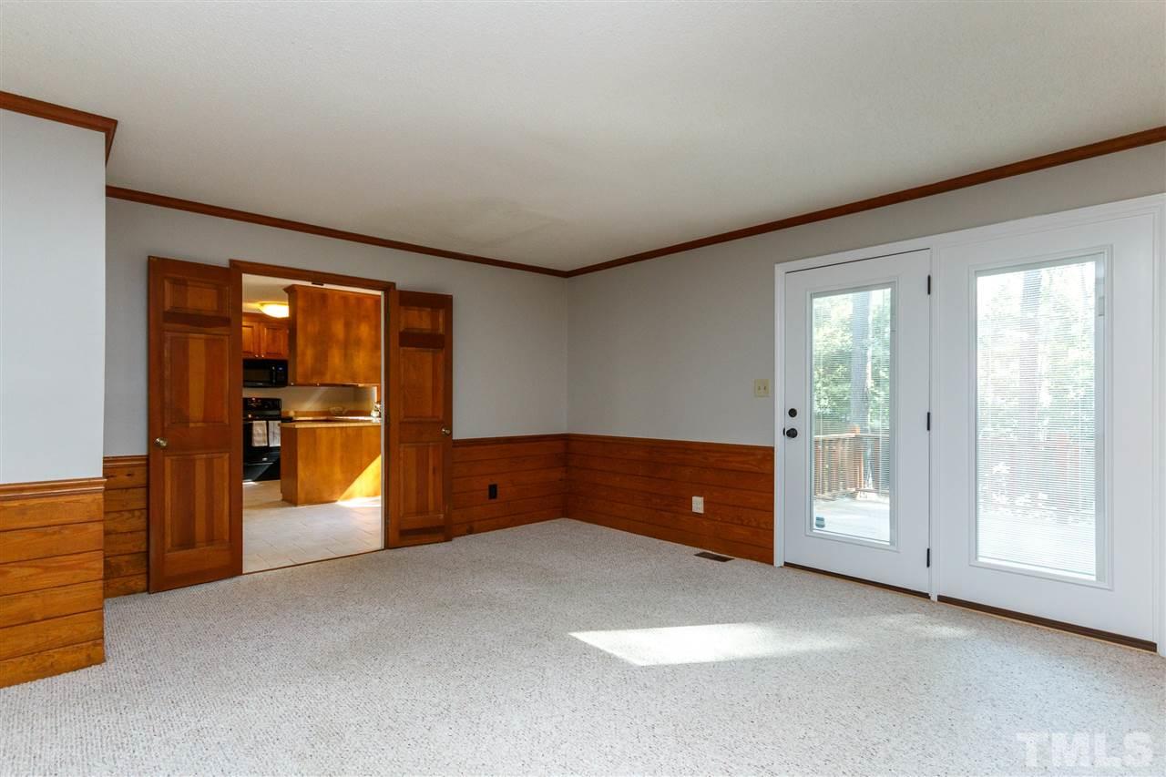 7420 Old Fox Trail Raleigh, NC 27613 - Photo 12 of 28 a view of an empty room with a window