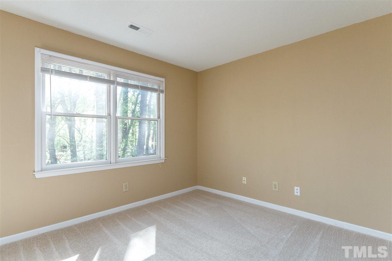 7420 Old Fox Trail Raleigh, NC 27613 - Photo 17 of 28 a view of an empty room with a window