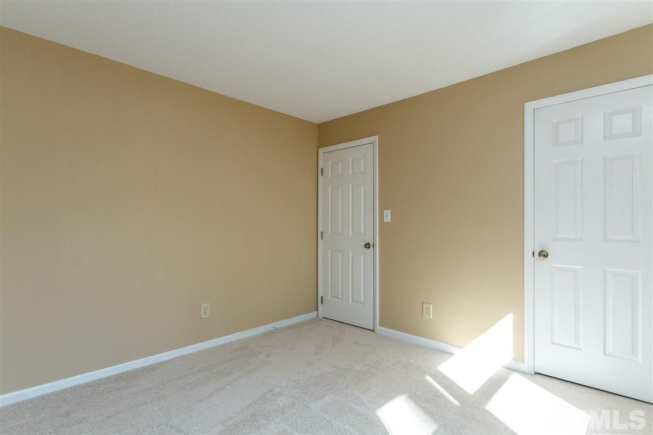 7420 Old Fox Trail Raleigh, NC 27613 - Photo 18 of 28 a view of an empty room