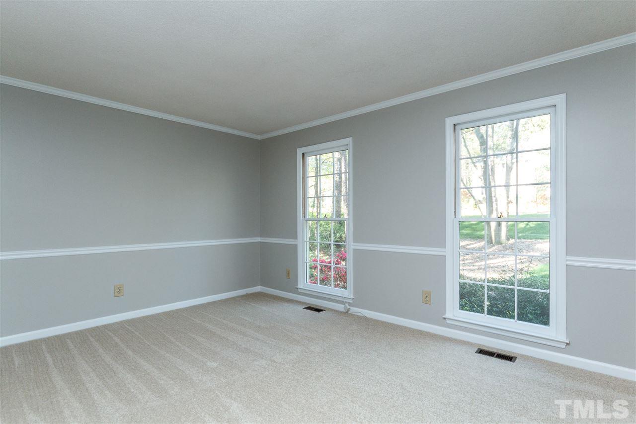 7420 Old Fox Trail Raleigh, NC 27613 - Photo 6 of 28 an empty room with windows