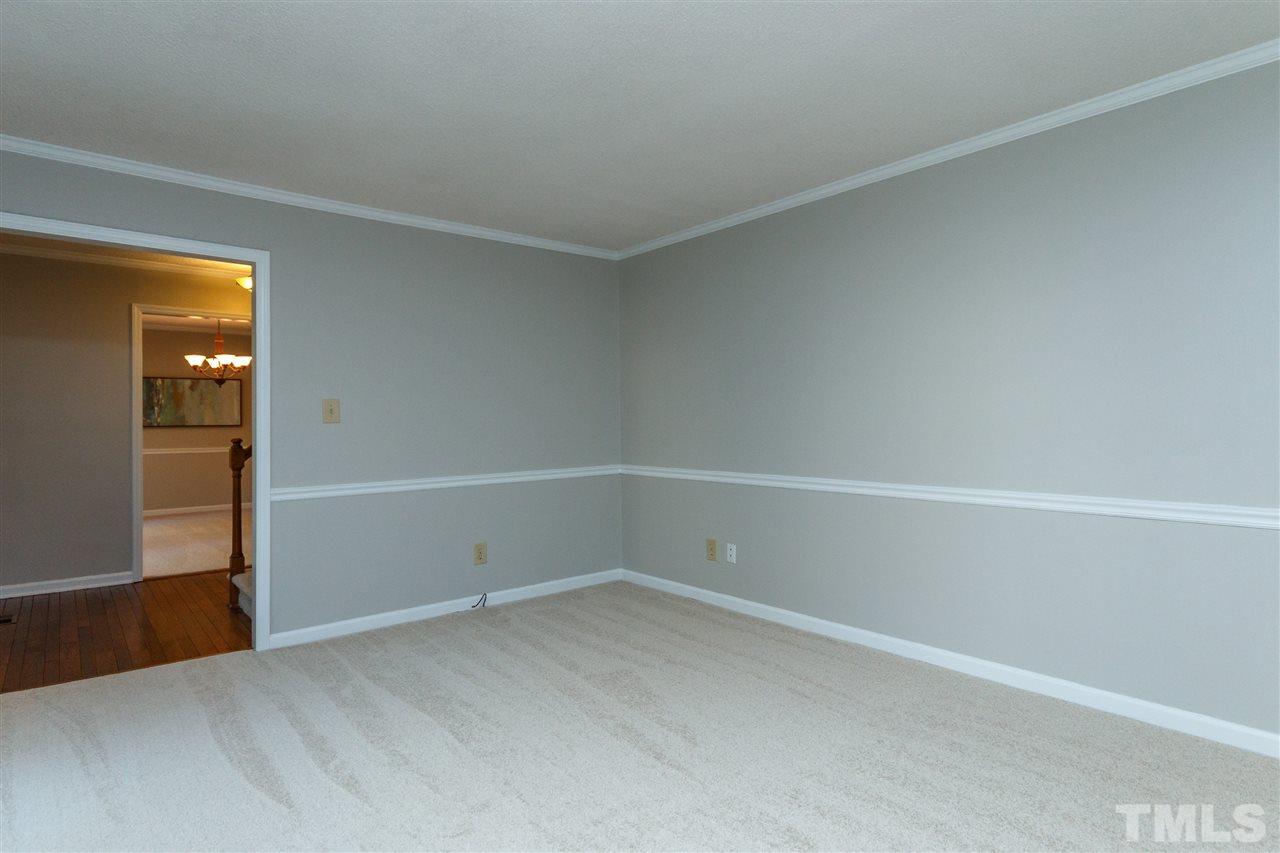 7420 Old Fox Trail Raleigh, NC 27613 - Photo 7 of 28 a view of an empty room