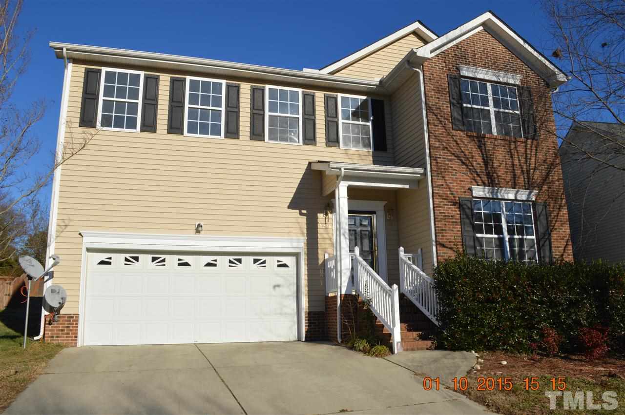 3216 Forest Mill Circle Raleigh, NC 27616 - Photo 1 of 25 a front view of a house with a yard