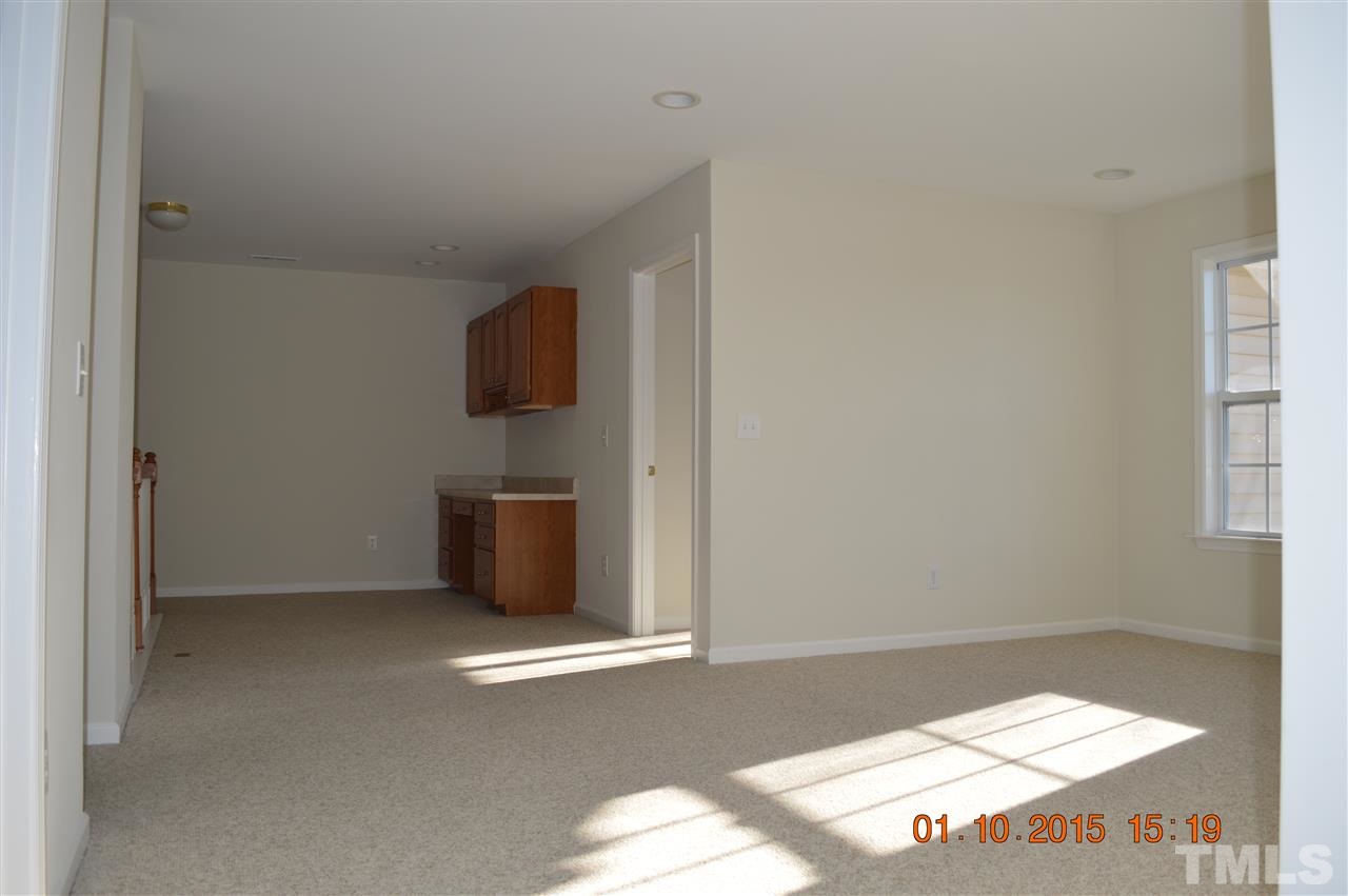 3216 Forest Mill Circle Raleigh, NC 27616 - Photo 16 of 25 a view of a livingroom with an empty space