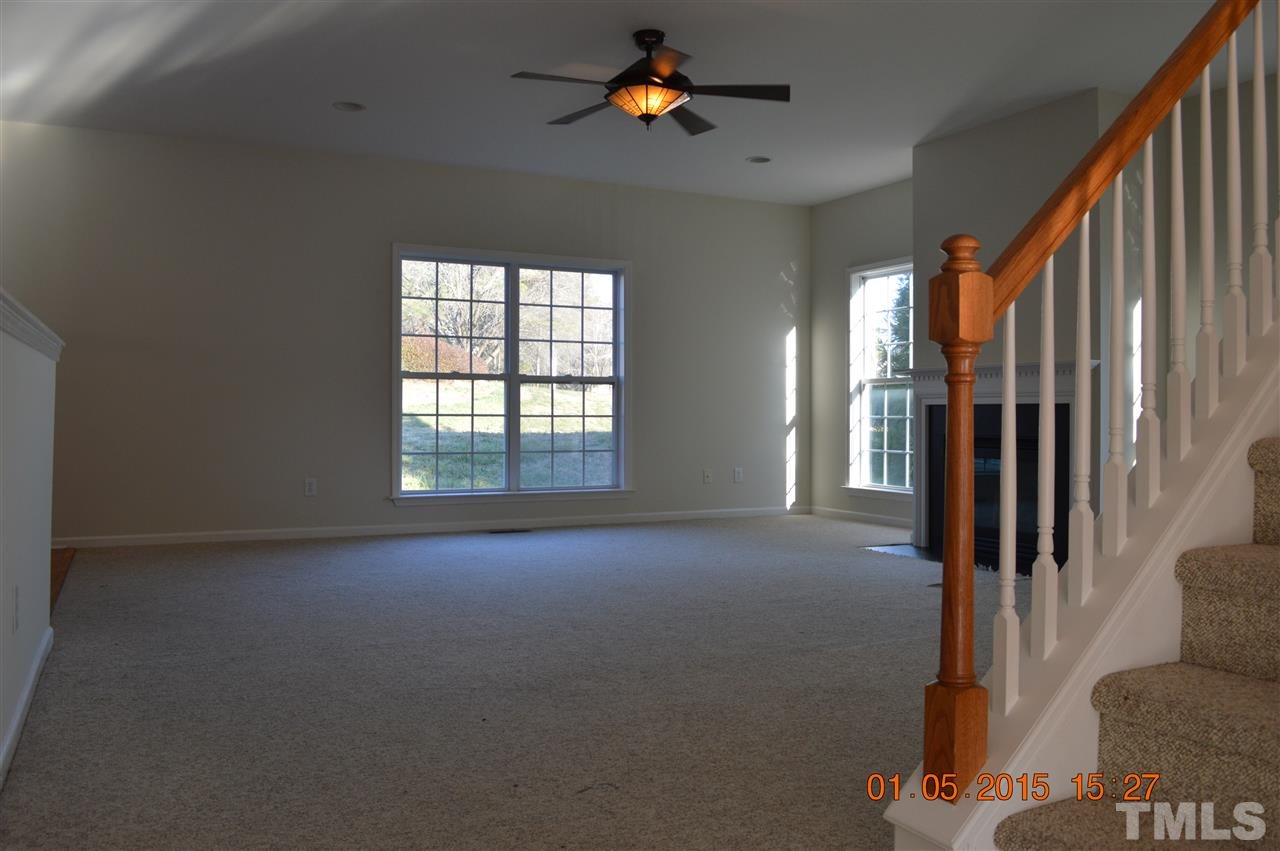 3216 Forest Mill Circle Raleigh, NC 27616 - Photo 3 of 25 wooden floor in an empty room with a window