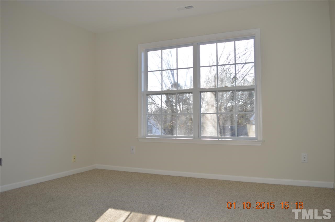 3216 Forest Mill Circle Raleigh, NC 27616 - Photo 21 of 25 an empty room with a window