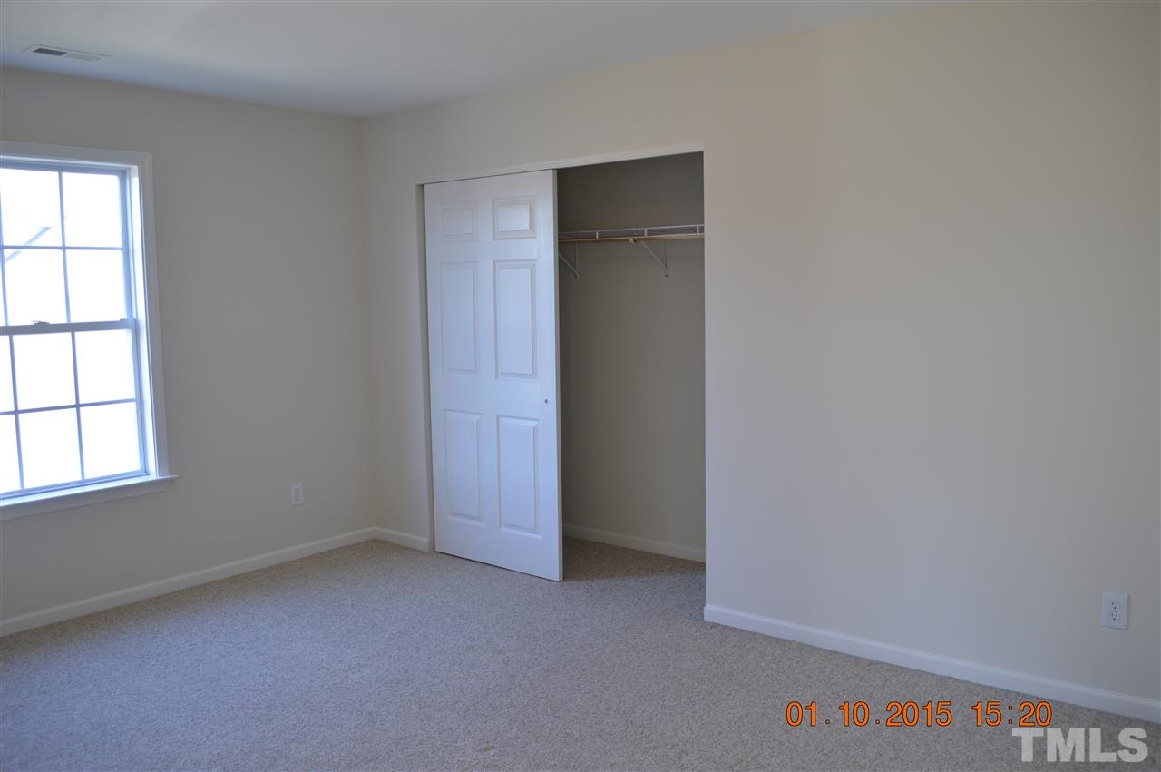 3216 Forest Mill Circle Raleigh, NC 27616 - Photo 22 of 25 an empty room with windows