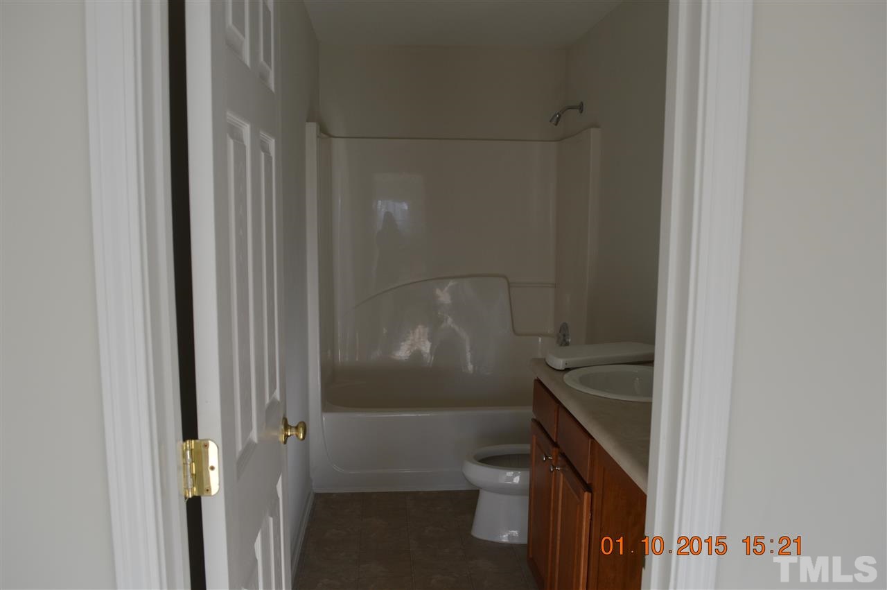 3216 Forest Mill Circle Raleigh, NC 27616 - Photo 23 of 25 a bathroom with a shower
