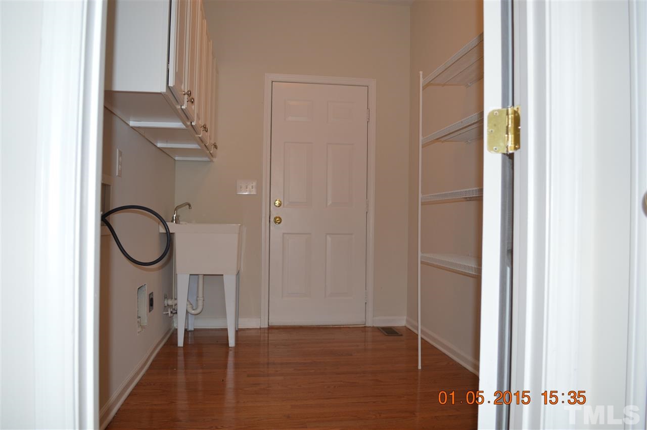3216 Forest Mill Circle Raleigh, NC 27616 - Photo 10 of 25 a bathroom with a glass shower door