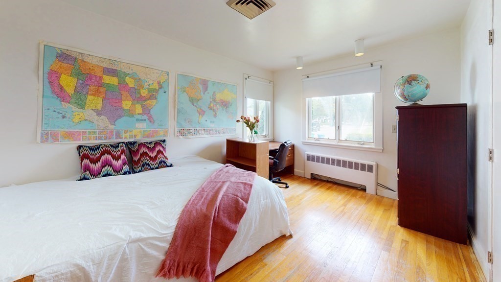 107 Truman Road Newton, MA 02459 - Photo 12 of 22 a bedroom with a bed and a window