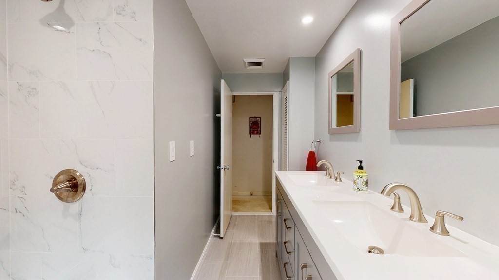107 Truman Road Newton, MA 02459 - Photo 15 of 22 a bathroom with a sink and a mirror