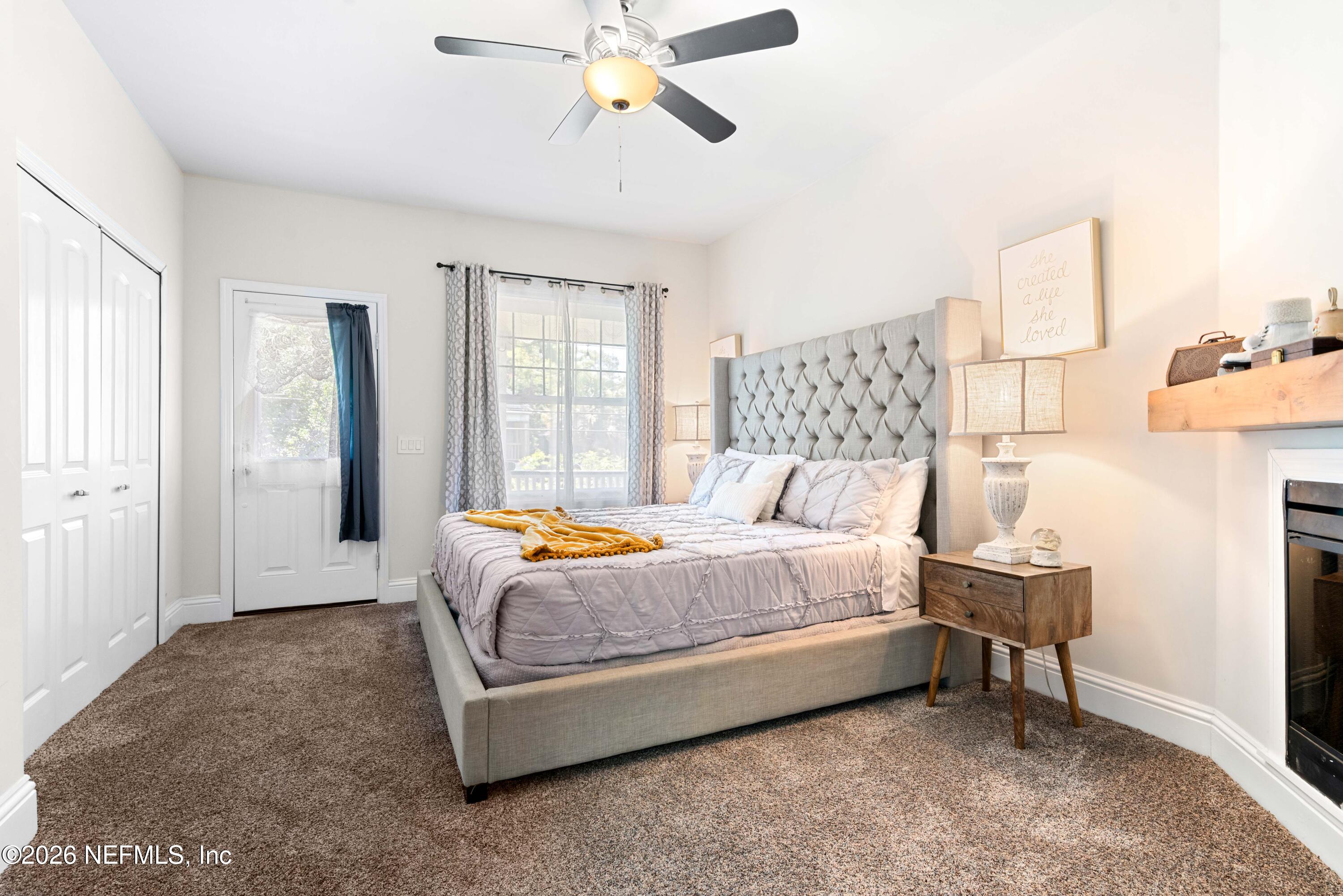 1138 Walnut Street Jacksonville, FL 32206 - Photo 31 of 37 a bedroom with a bed and window
