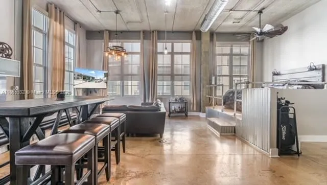 a view of a livingroom with furniture window and outside view