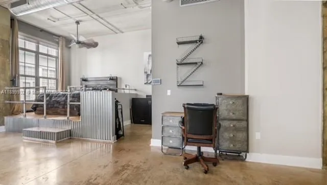 a view of a entryway door with living room view