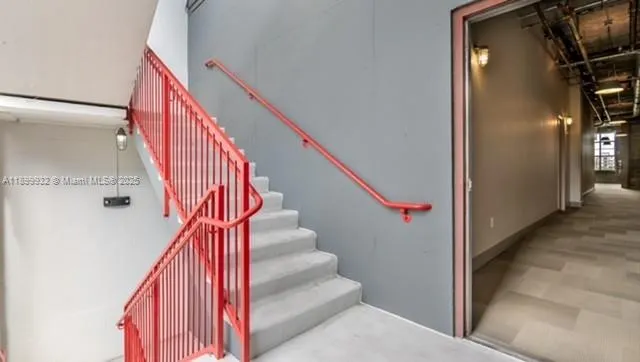 a living room with lots of furniture and a table